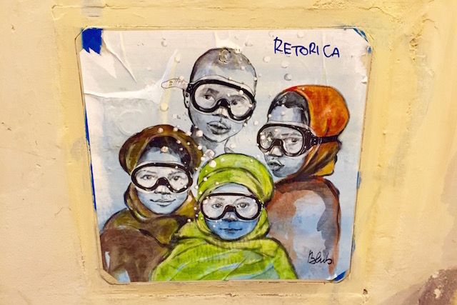 рисунок стрит-арт художника из Флоренции Blub, на котором изображены дети с плавательными масками на лице.